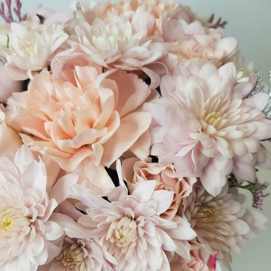 Flowers in a white box. A delicate pastel arrangement with diantus, cotton, and chrysanthemum