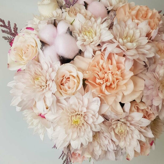 Flowers in a white box. A delicate pastel arrangement with diantus, cotton, and chrysanthemum