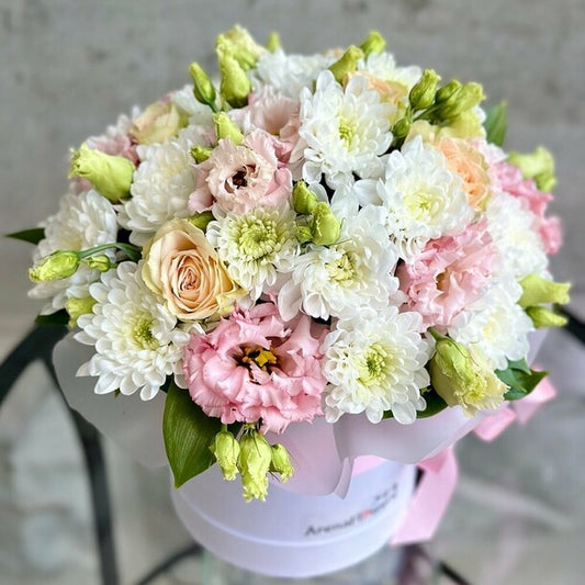 A composition with roses, eustoma, and chrysanthemum "Romance"