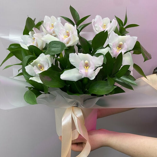 A box of white orchids